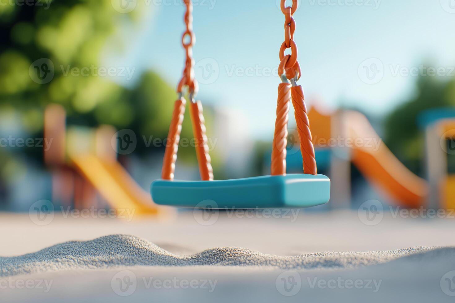 Empty swing hangs at a playground photo
