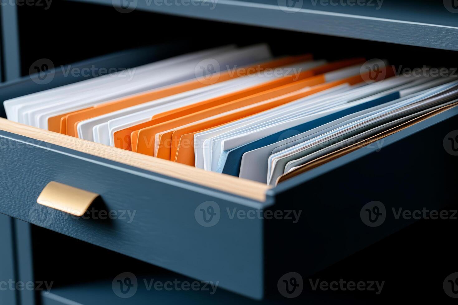 Modern filing cabinet drawer containing neatly organized folders photo