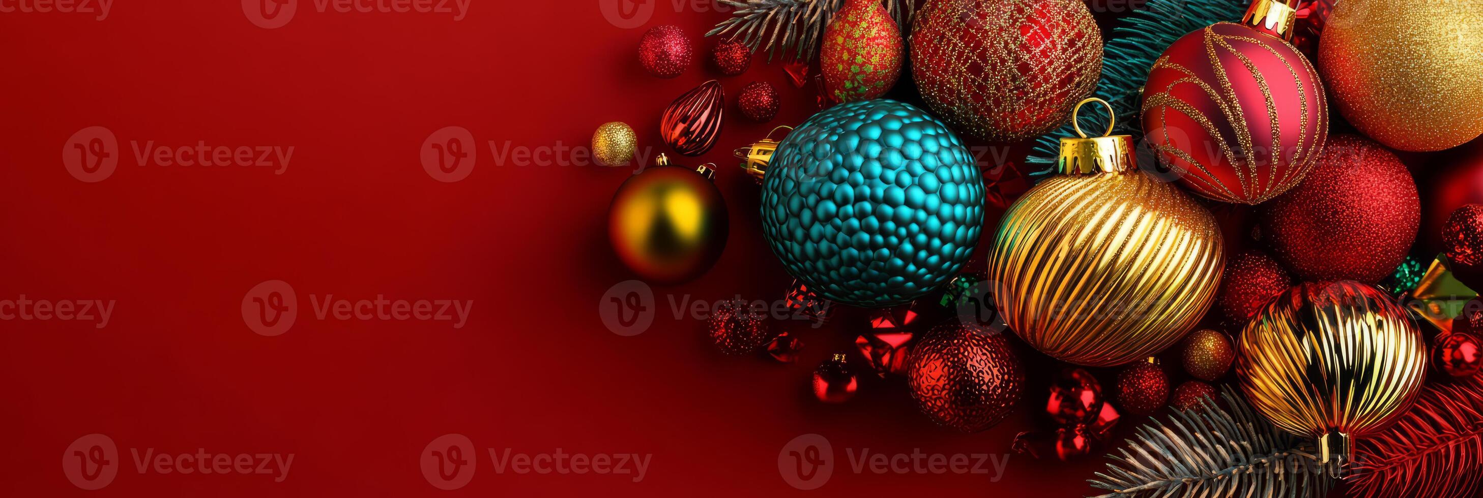 Arrangement of Christmas ornaments and holiday decorations on a red background photo