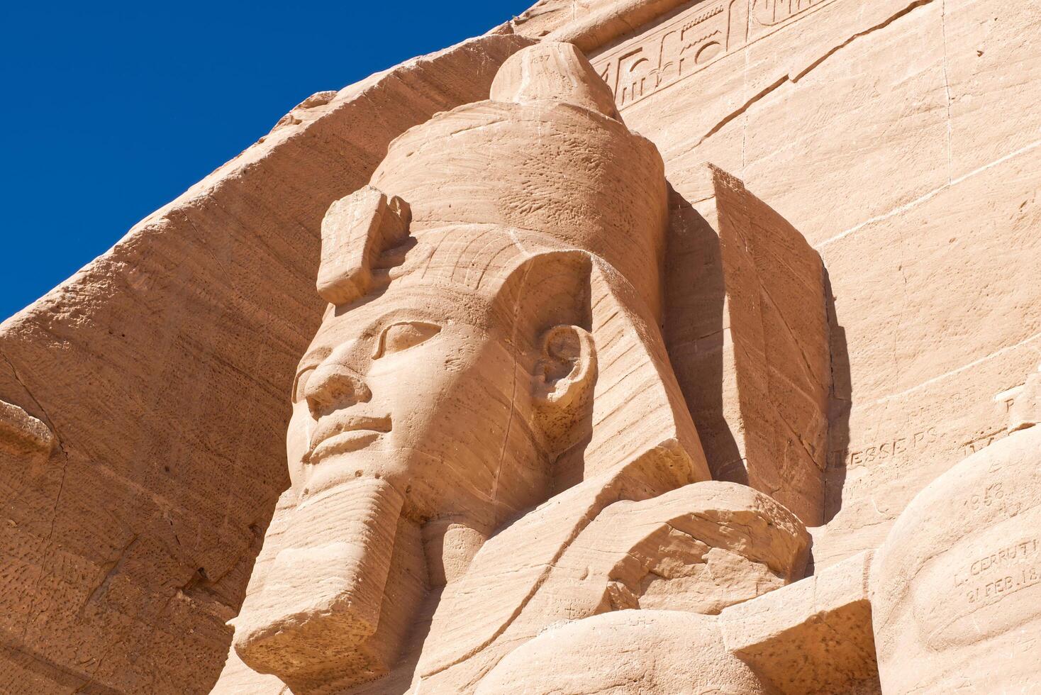 Abu Simbel Egypt March 20, 2023 The big statue of Ramses II at Abu Simbel temple. photo