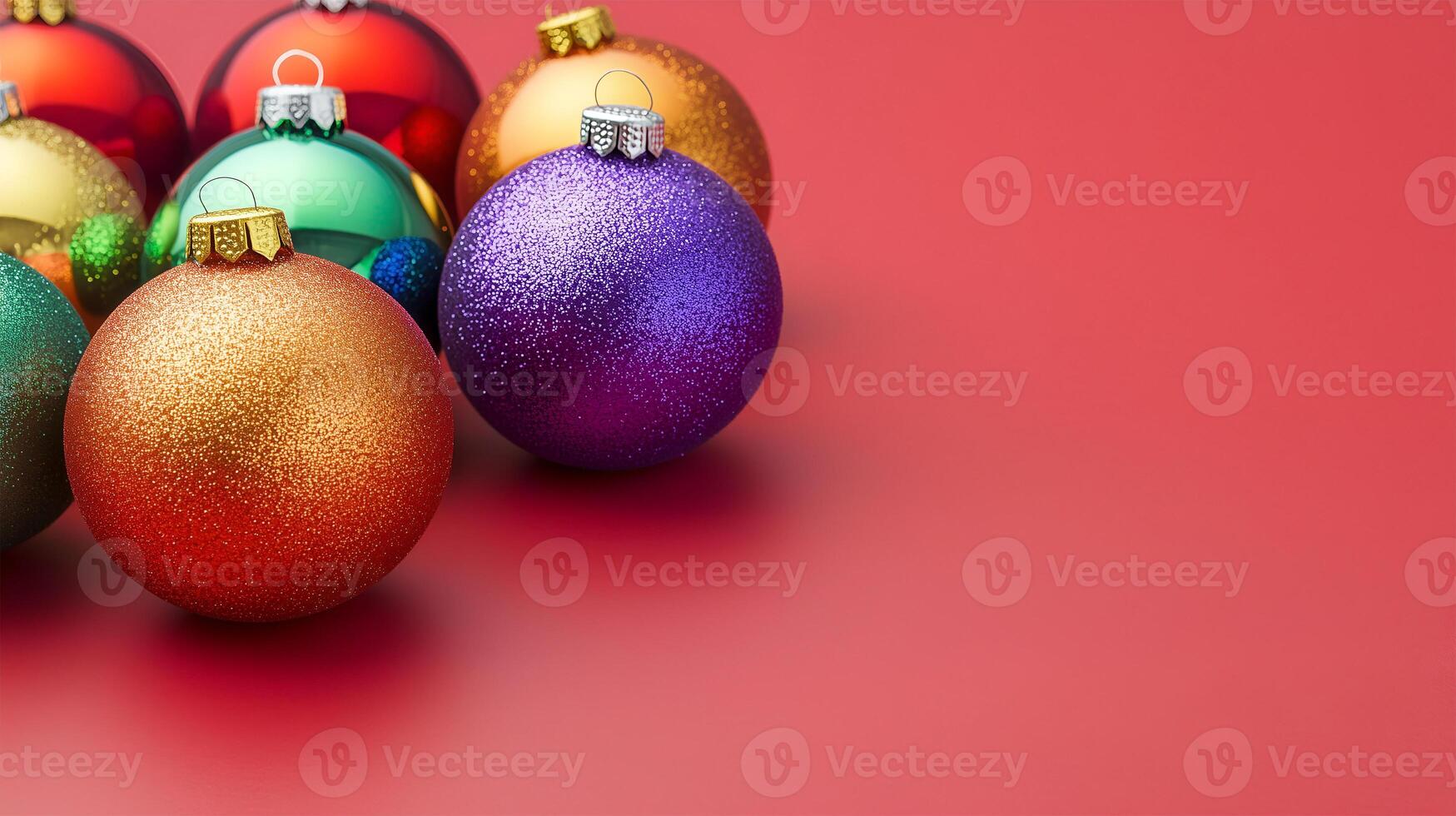 Colorful Christmas ornaments on a red background with space for festive text photo