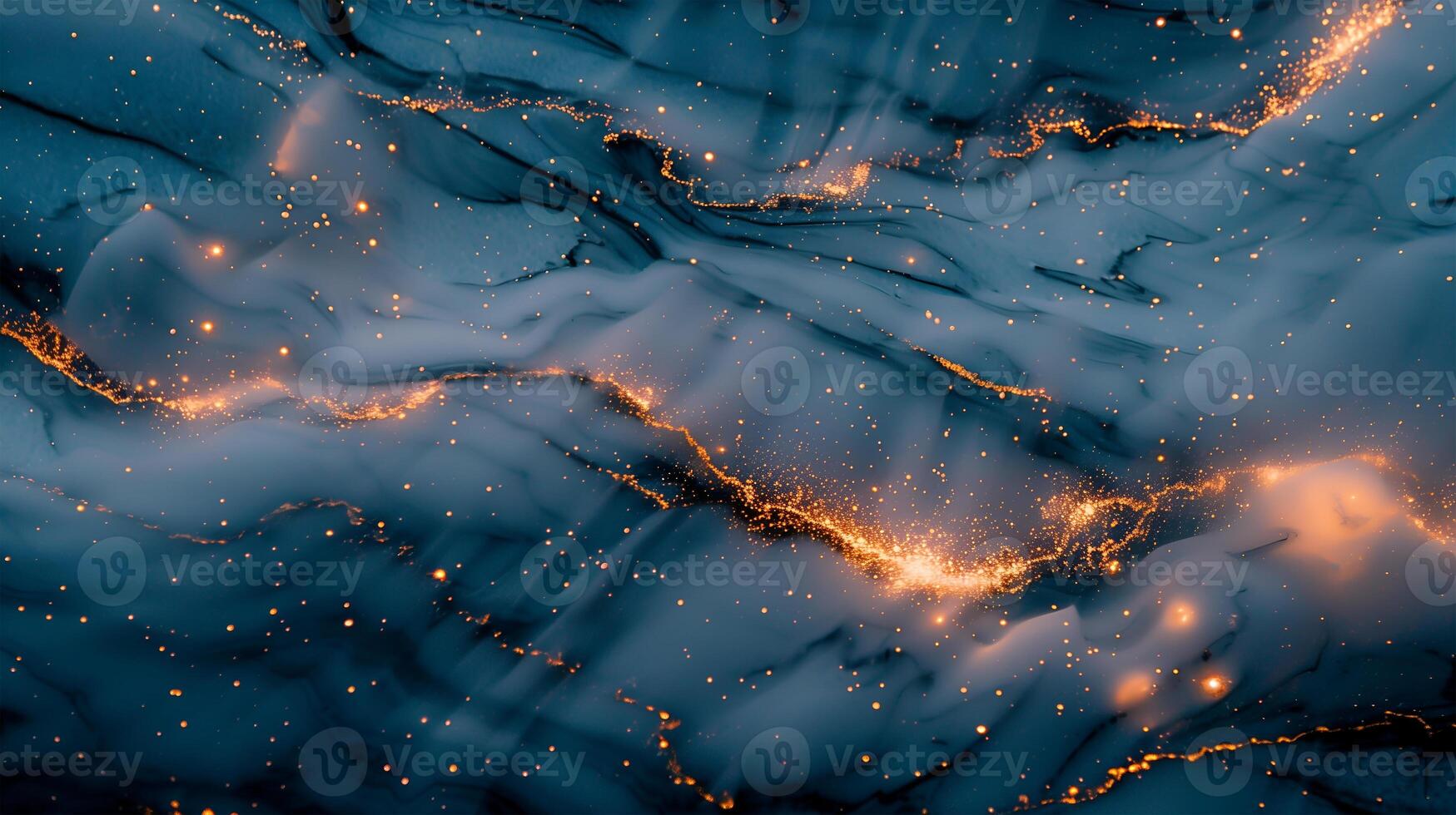 A swirling marble texture with golden accents on a deep blue background at night photo