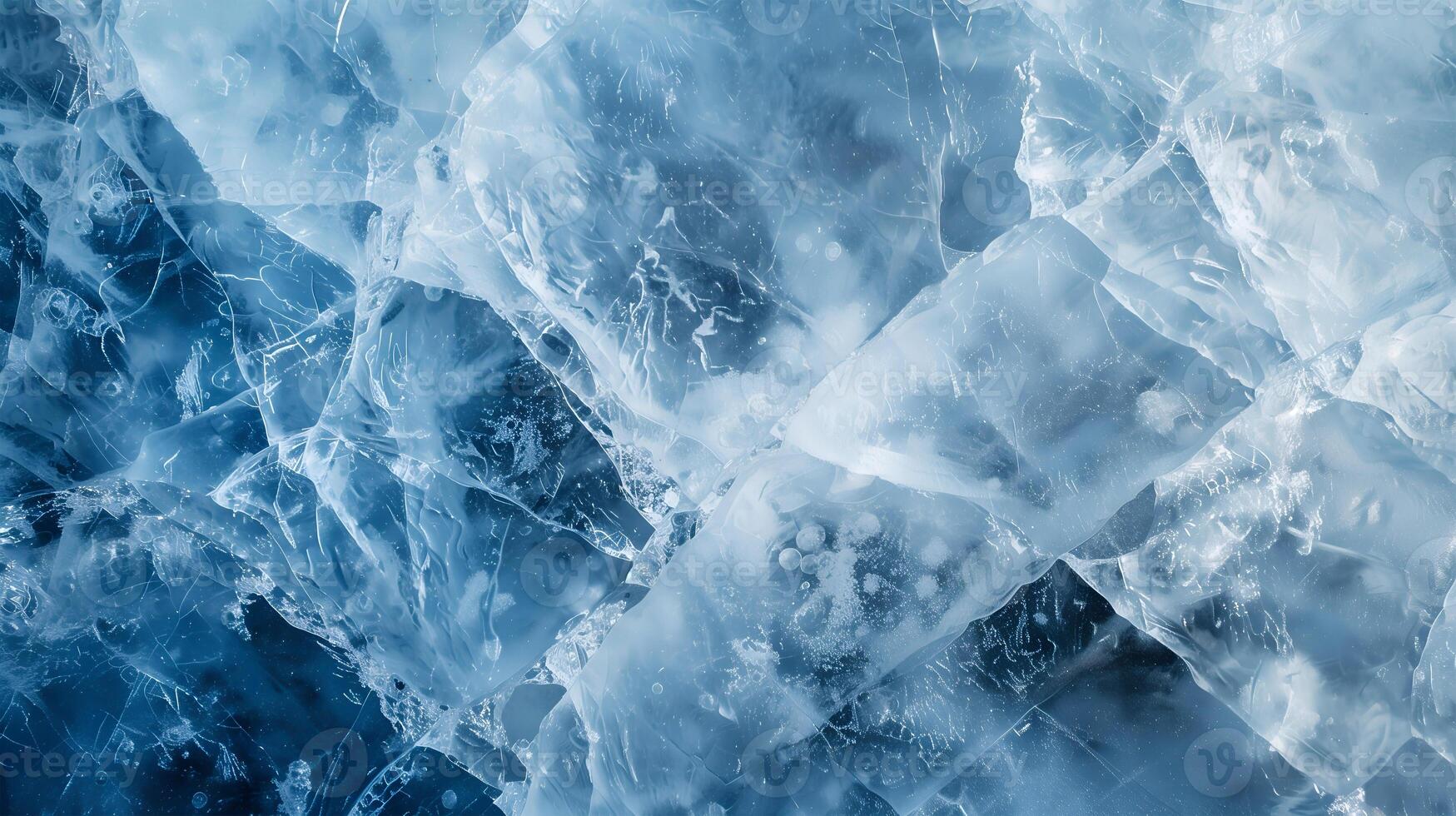 Delicate icy textures captured close-up with shades of blue and hints of clarity reflecting light photo