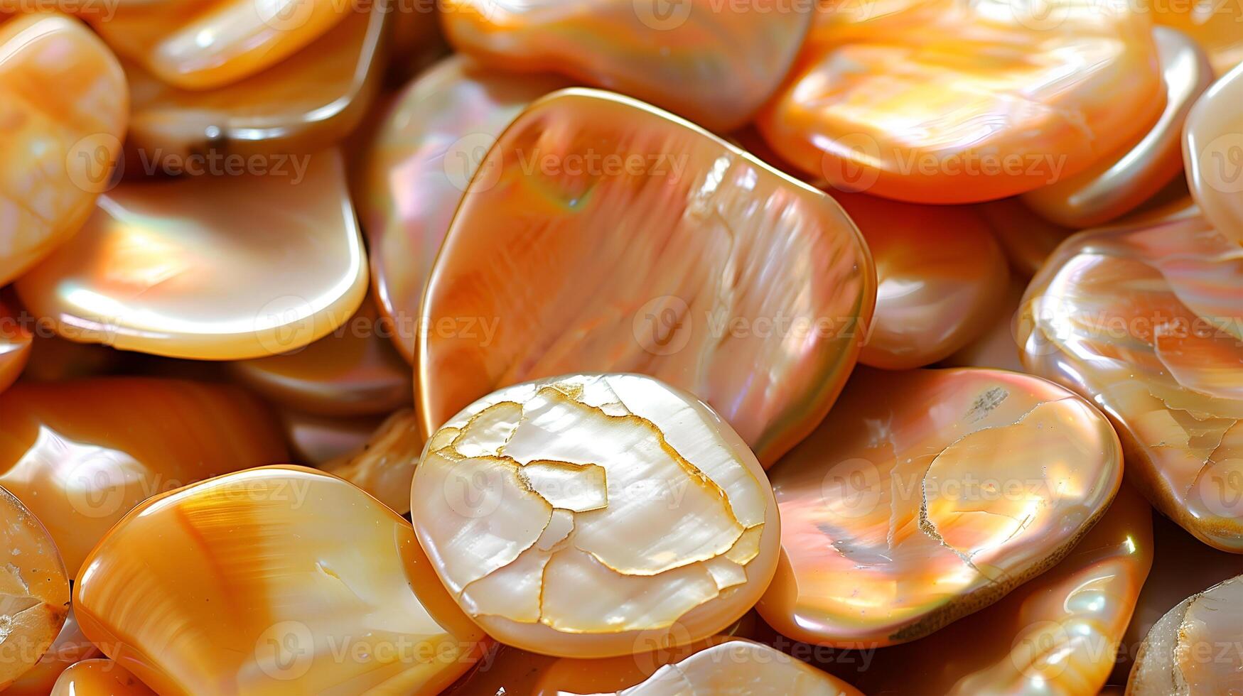 Various iridescent pearls lay against a soft background, showcasing their unique textures and colors photo