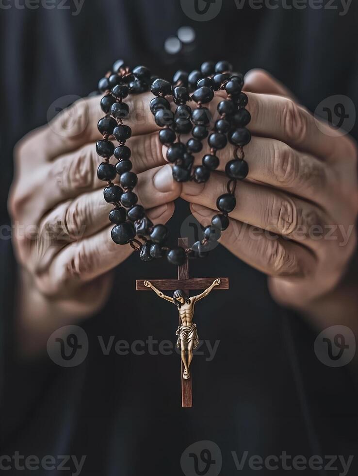 A person praying with a rosary, reflecting on faith and devotion in a moment of spirituality photo