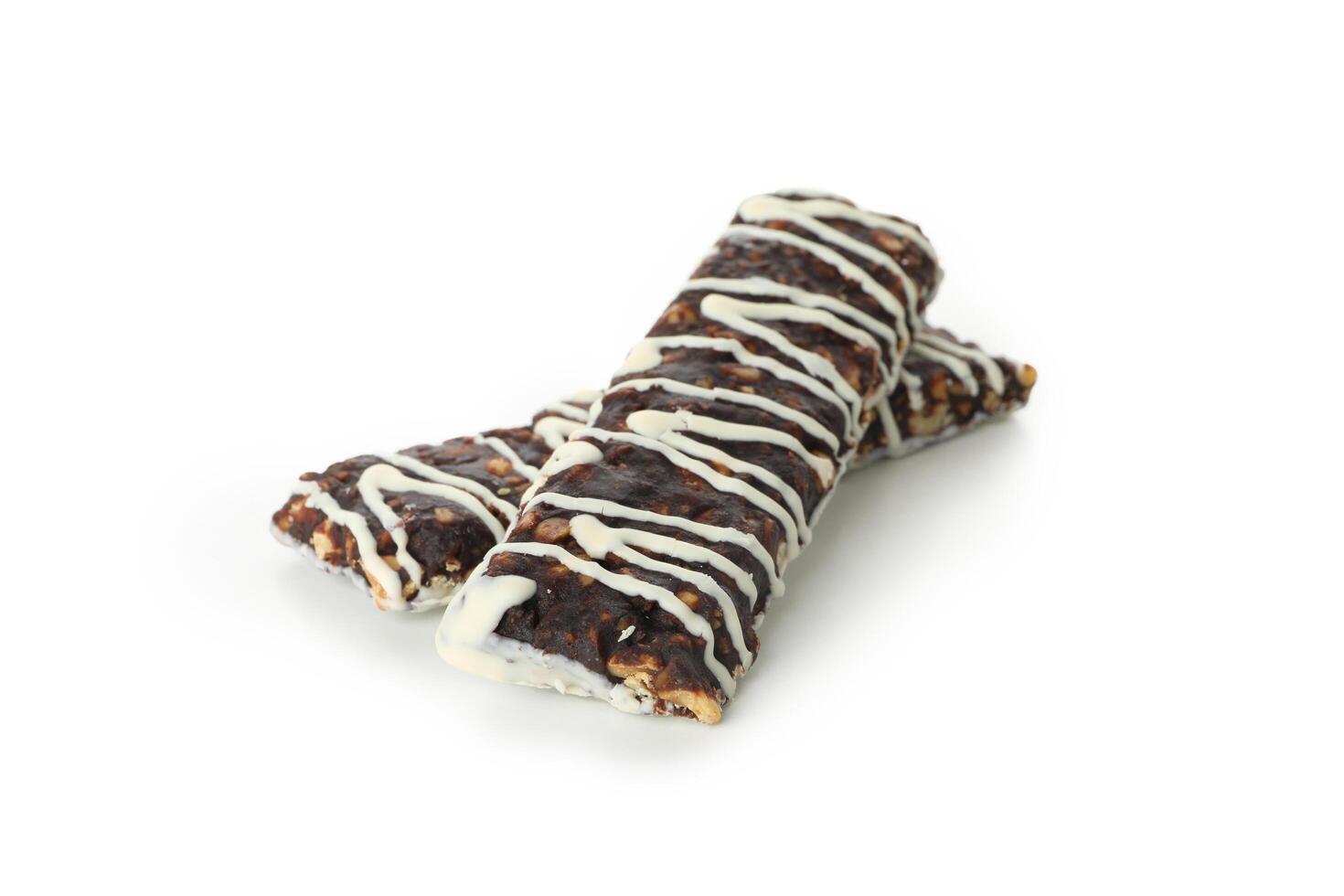 Tasty granola bars isolated on white background photo