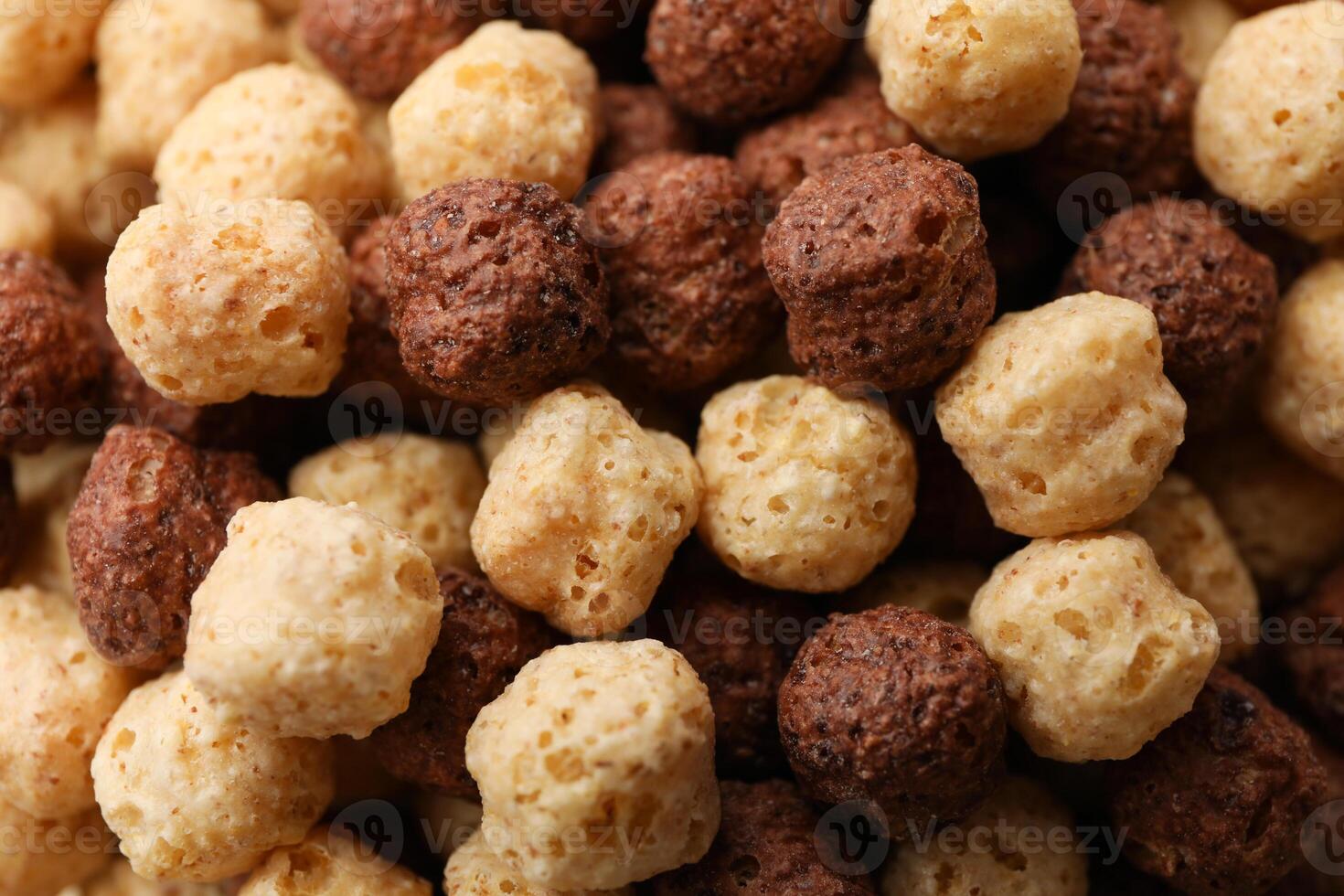 Tasty corn balls on whole background, close up photo
