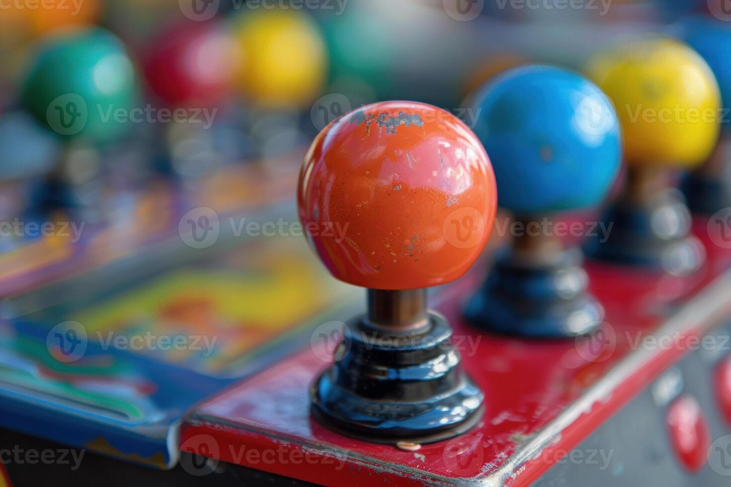 Close up view of colorful round joysticks of an old arcade game machine photo