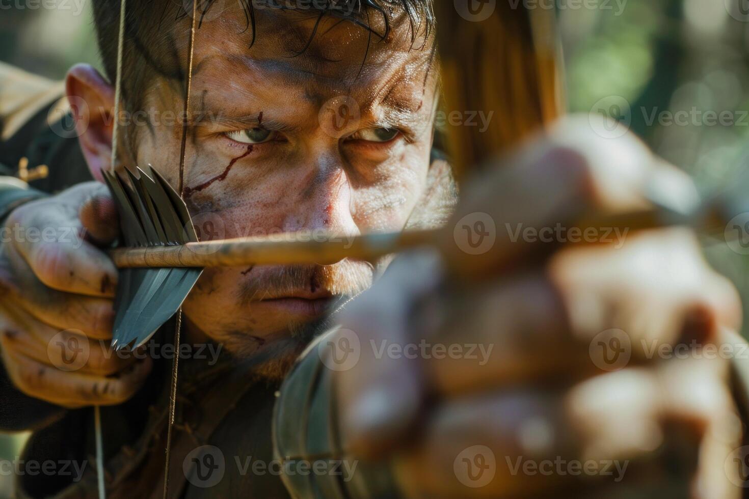 Warrior with bow and arrow aiming at target photo