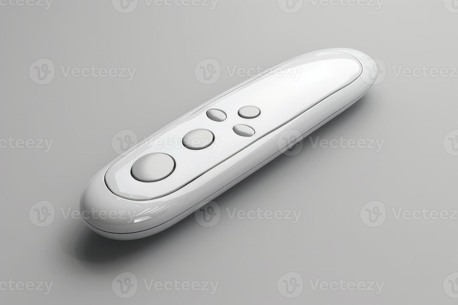 Modern remote control lying on a gray surface photo