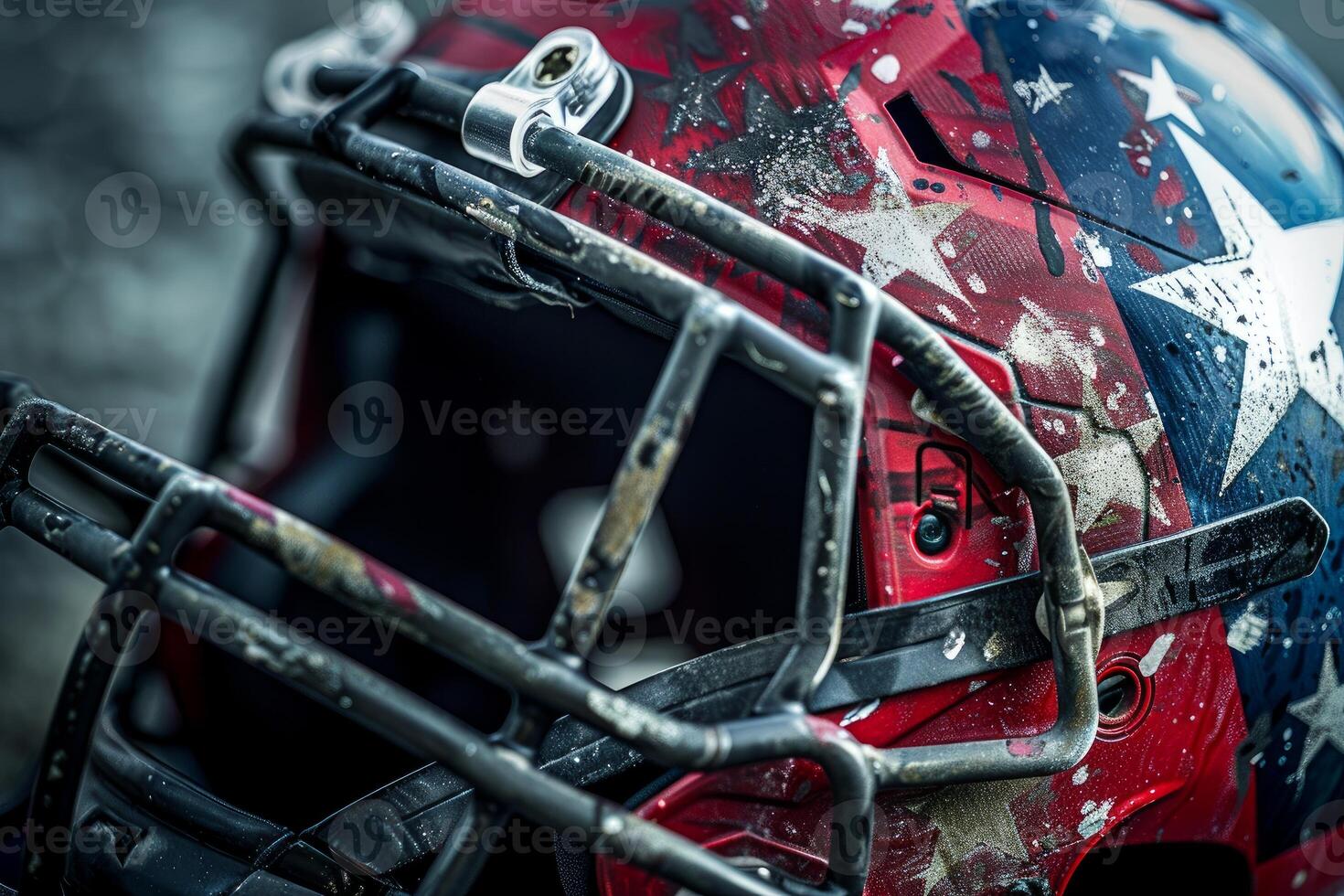 American football helmet showing stars and stripes design laying on ground photo