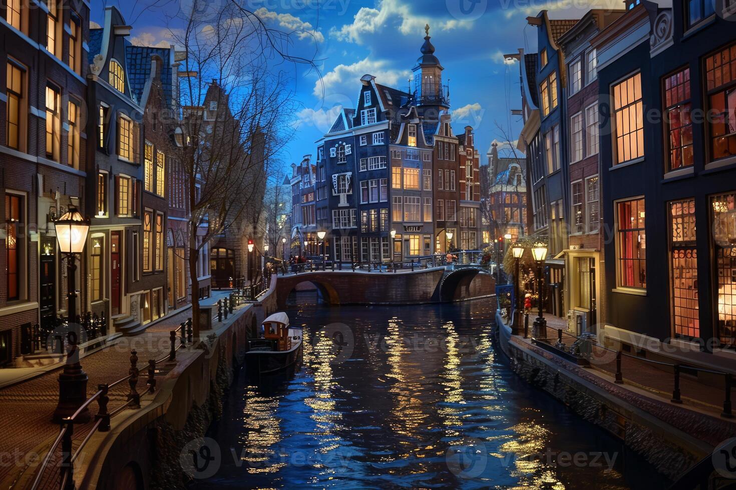 Canal reflecting city lights at dusk with tourists and locals walking by amsterdam landmark buildings photo