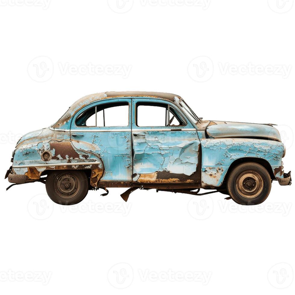 Old rusty blue car isolated showing its age and decay photo