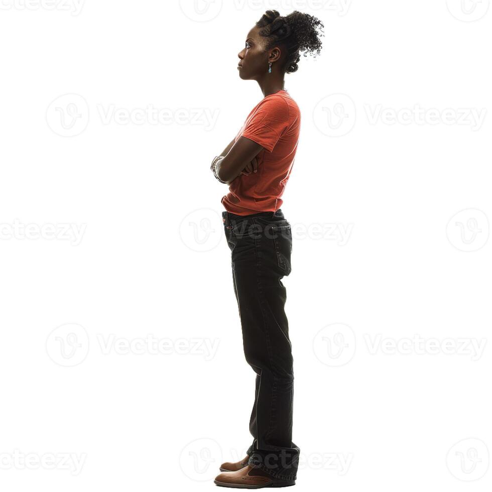 Young woman standing sideways folding her arms photo