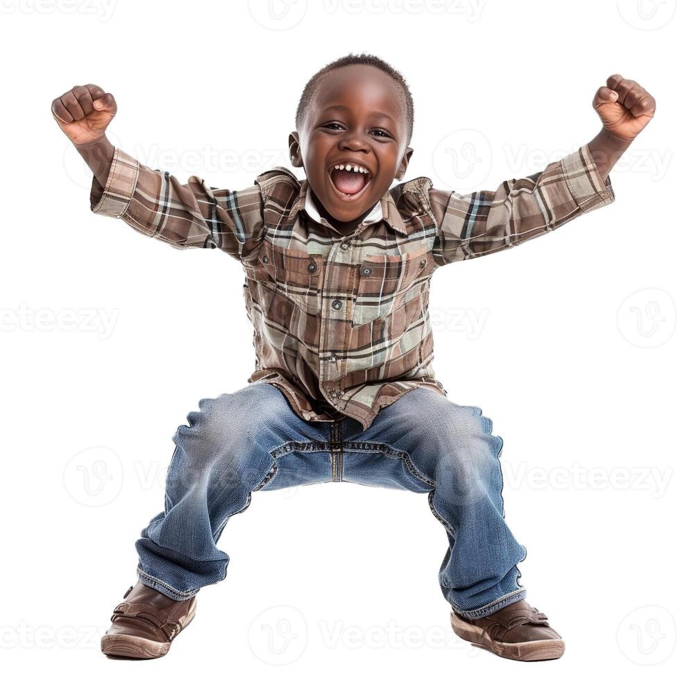 Little boy jumping and celebrating with enthusiasm on white background photo
