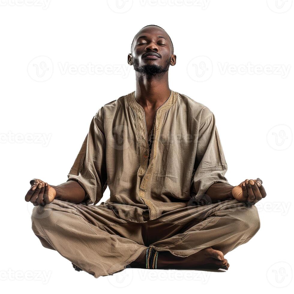 Young african man sitting in lotus position meditating with eyes closed photo