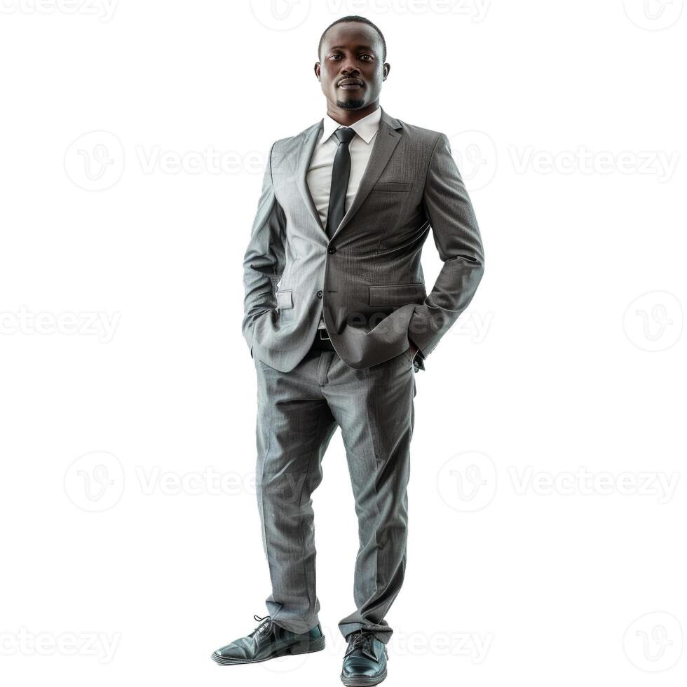 Confident businessman standing with hands in pockets on white background photo