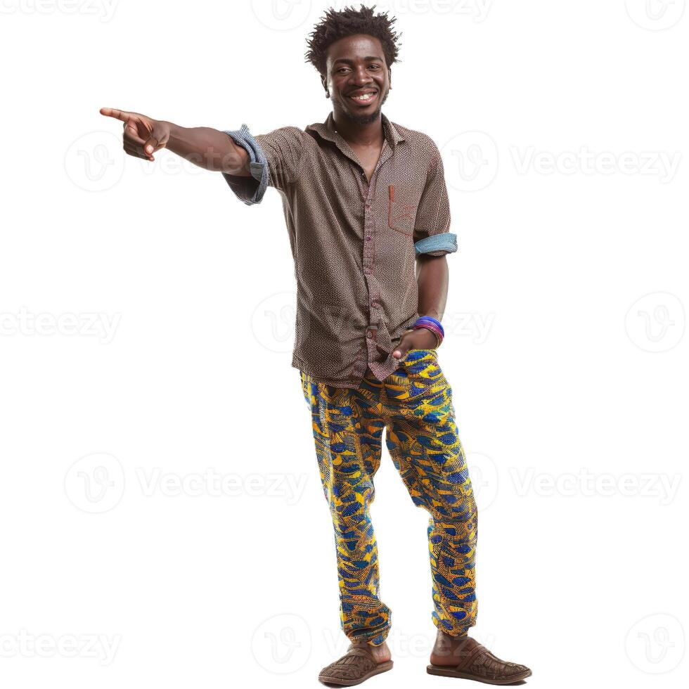 Smiling young man pointing with his finger wearing colorful clothes photo