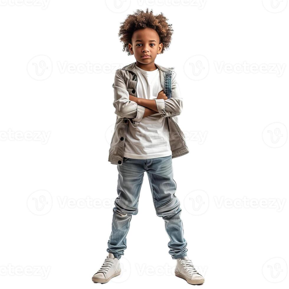 Stylish little boy with afro hair standing with crossed arms photo