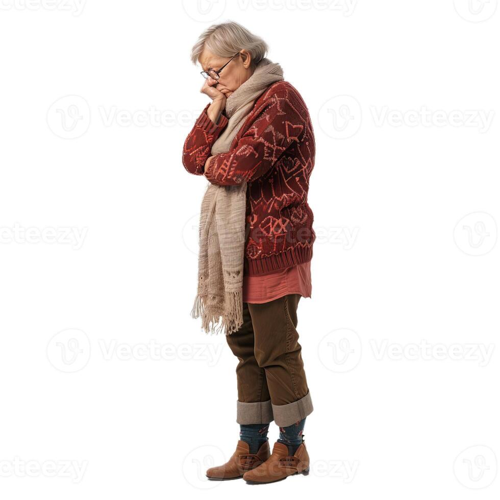 Pensive senior woman in warm clothing photo