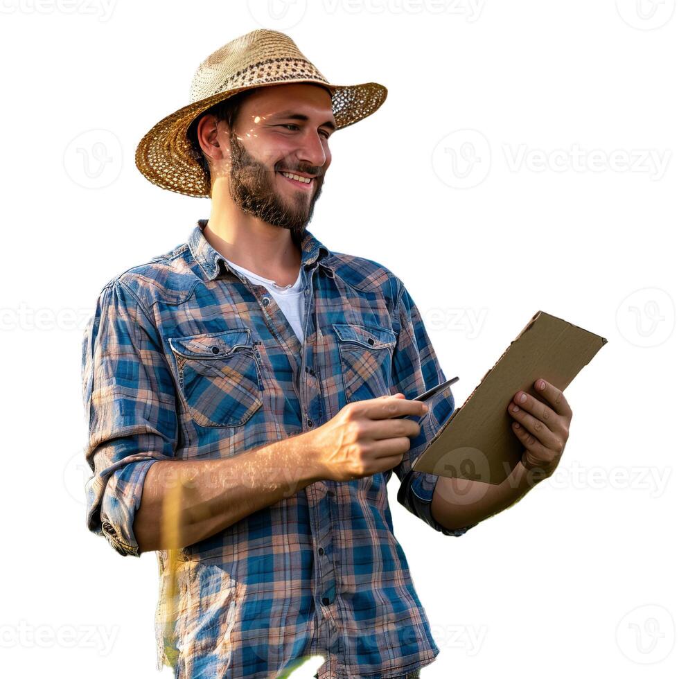 Smiling farmer analyzing notes on clipboard while standing in field photo