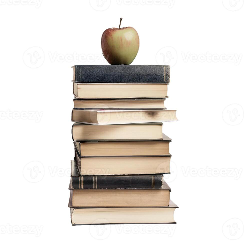 Stack of old books with a green apple on top symbolizing knowledge photo