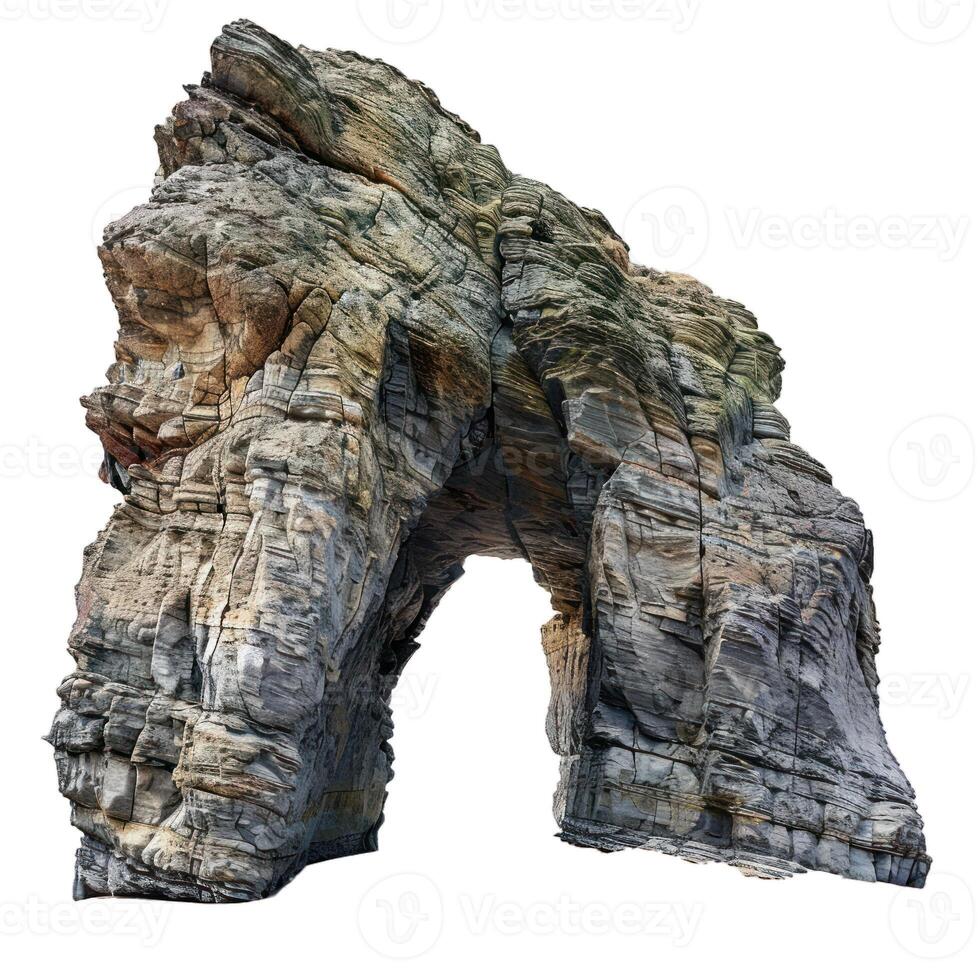 Huge natural arch forming in a cliff face isolated photo