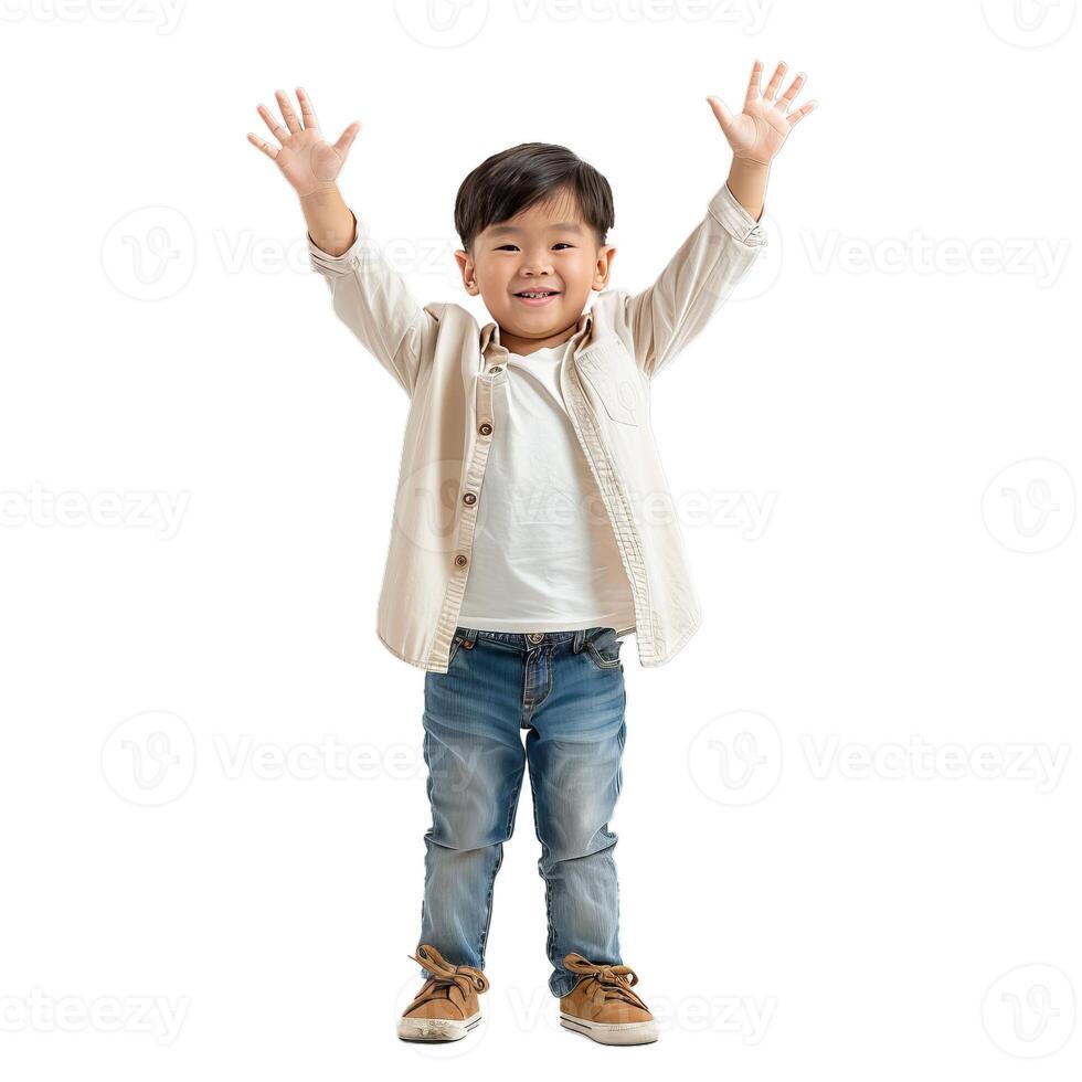 Happy child celebrating with raised hands photo