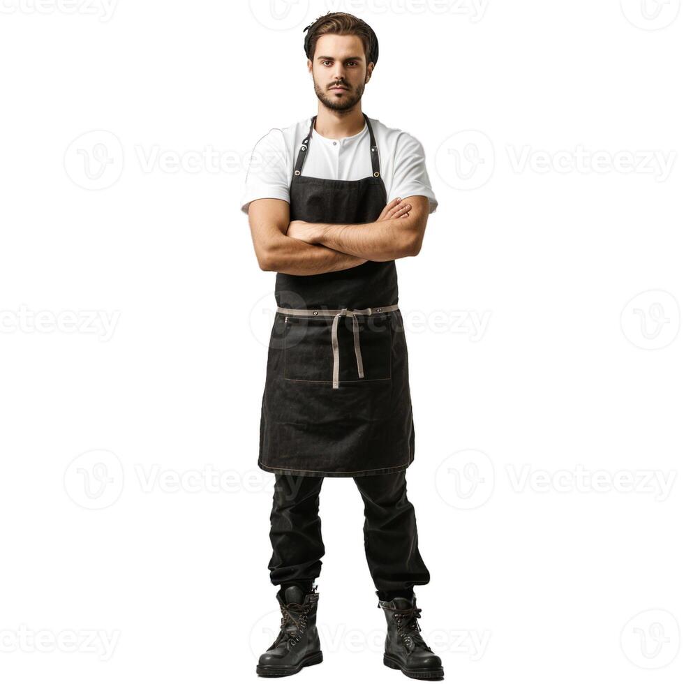 Confident male chef wearing black apron posing with crossed arms on white background photo