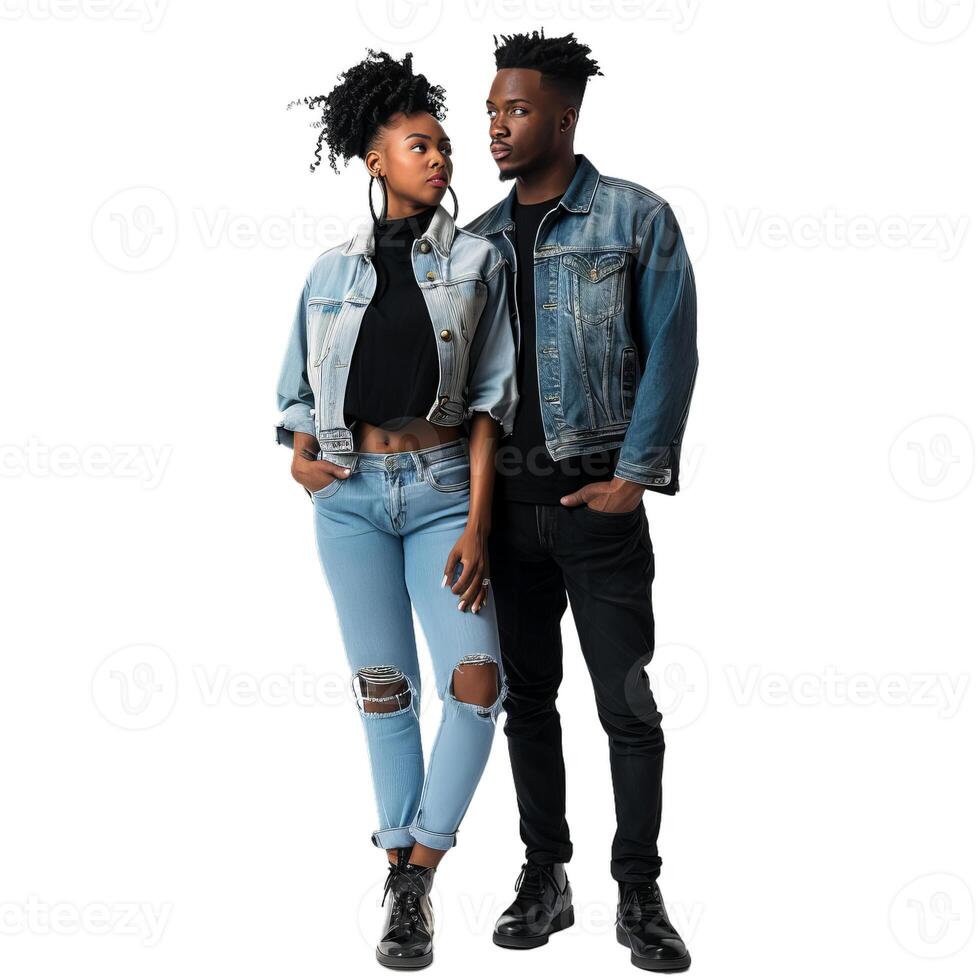 Stylish young couple wearing denim jackets posing on white background photo
