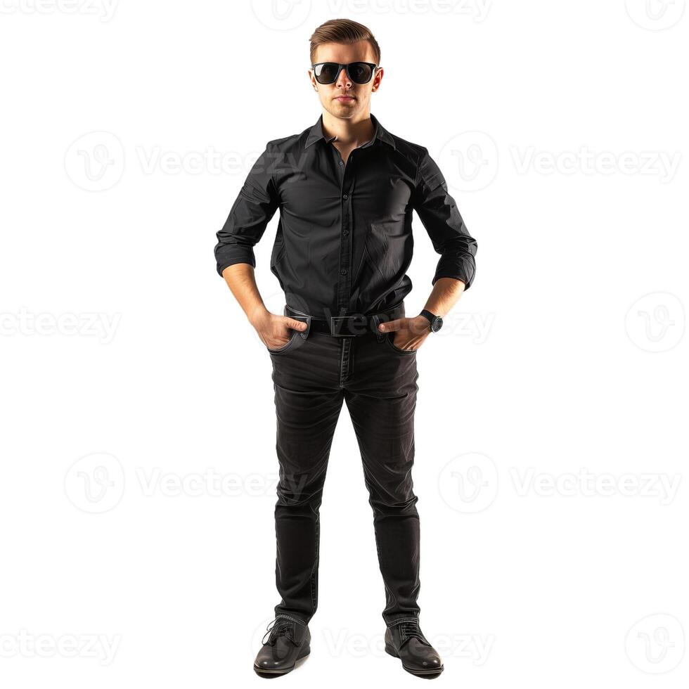 Serious security agent standing with hands in pockets wearing black clothes photo