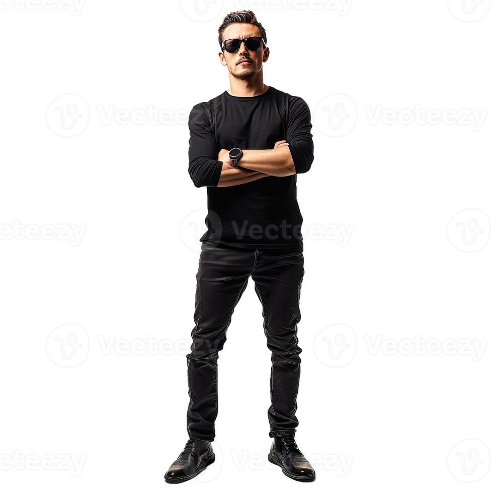 Serious man wearing black clothes and sunglasses crossing arms standing on white background photo