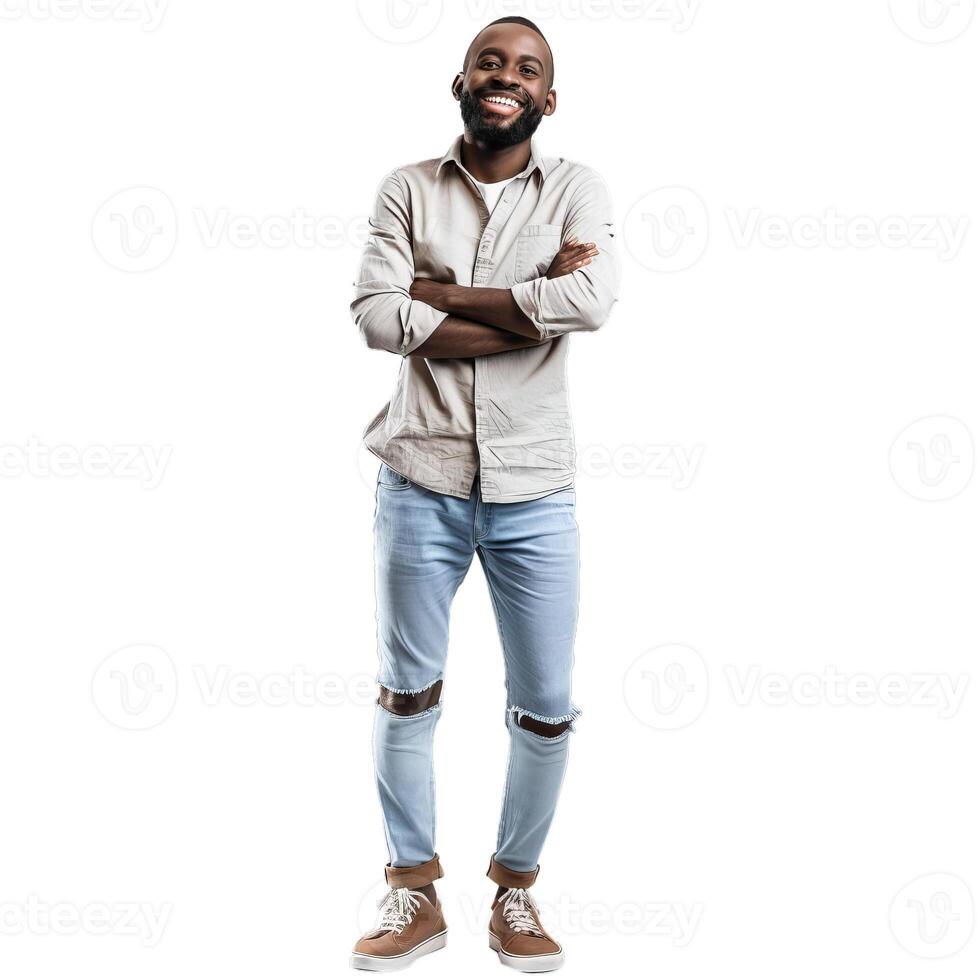 Handsome young black man standing with folded arms smiling at camera photo