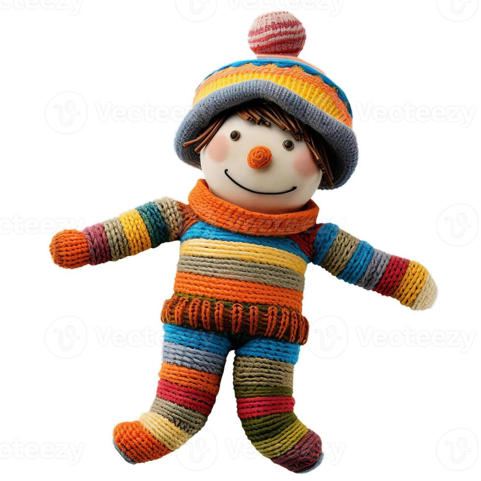Smiling knitted rag doll wearing colorful winter clothes is posing photo