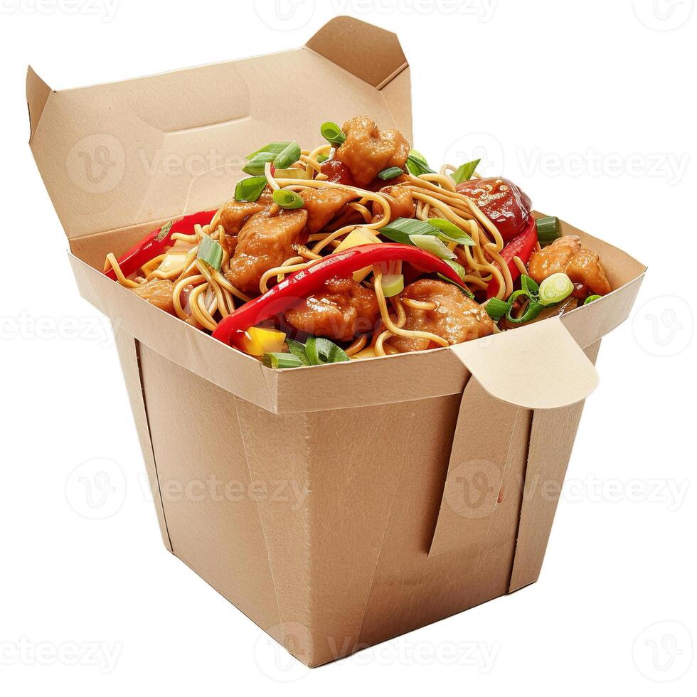 Wok with chicken and vegetables is packed in cardboard box for delivery photo