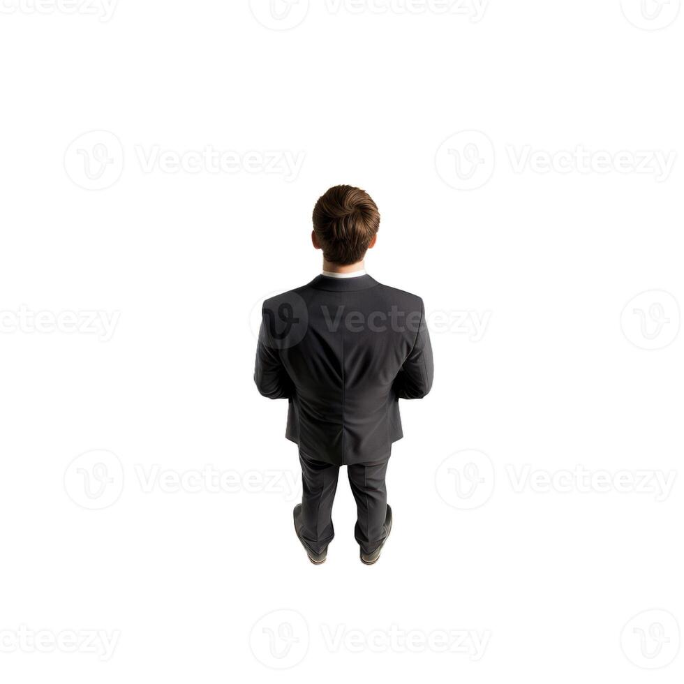 Businessman standing looking up at copy space photo