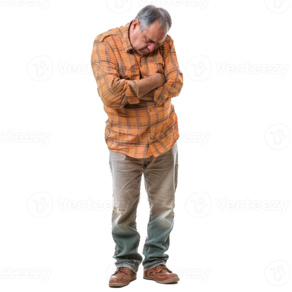 Senior worker looking down with arms crossed feeling sad and disappointed photo