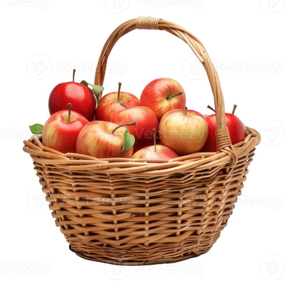 Wicker basket overflowing with freshly picked red apples photo