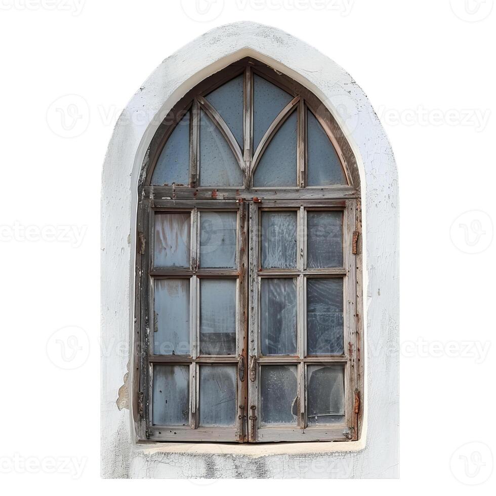 Old arched wooden window with weathered glass panes on white wall photo