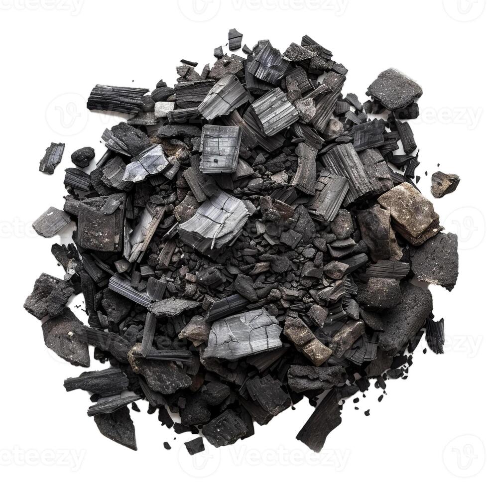 Pile of black coal chunks forming a circle on white background photo