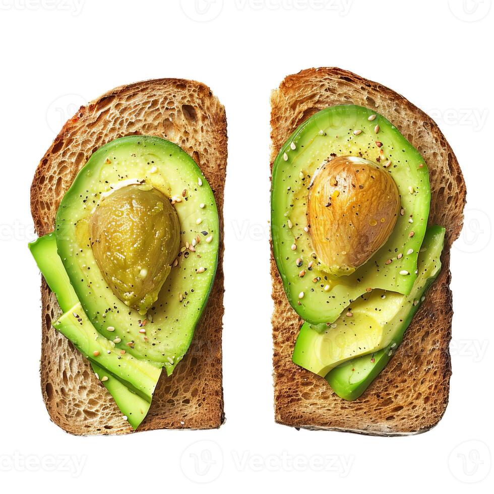 Two slices of toasted whole grain bread topped with sliced avocado and everything bagel seasoning photo