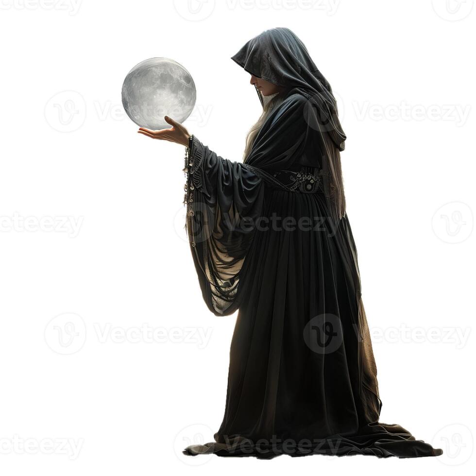 Mysterious woman in black hood holding the moon in her hand photo