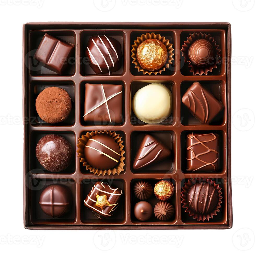 Box of assorted gourmet chocolates with different shapes and flavors photo