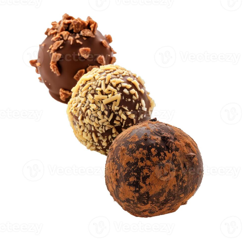 Chocolate truffles with cocoa powder and nuts falling on white background photo