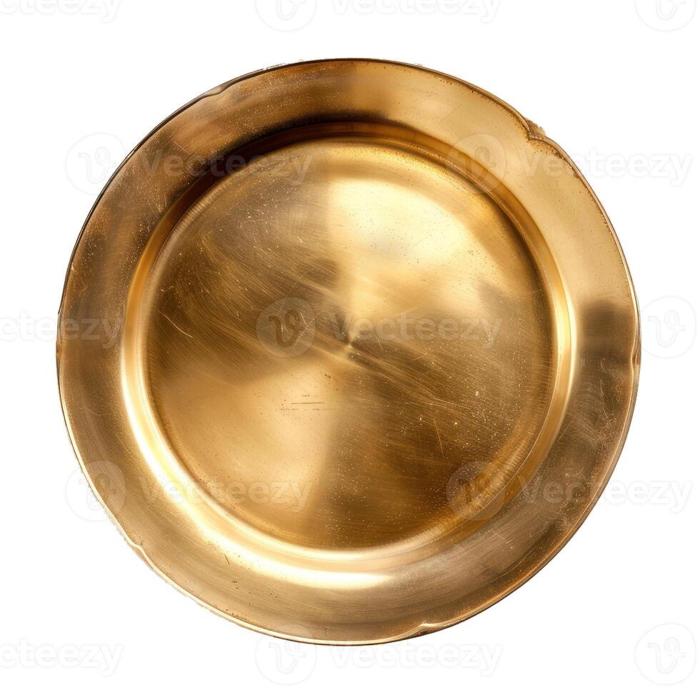 Empty golden plate with scratches isolated on white background photo