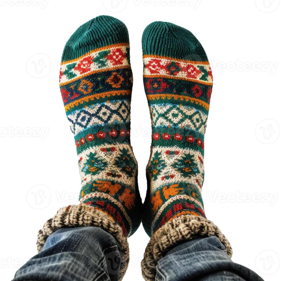 Man wearing warm knitted wool socks showing feet photo