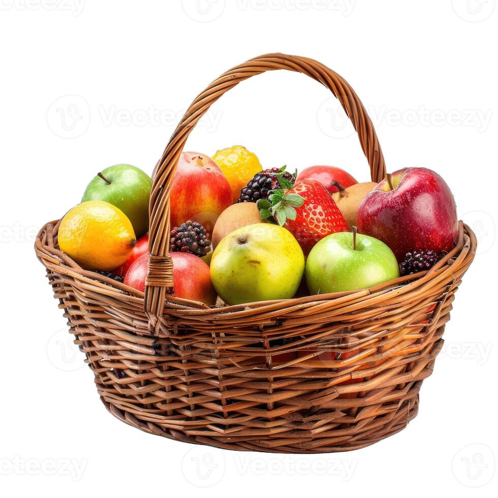 Wicker basket overflowing with freshly picked fruit on white background photo