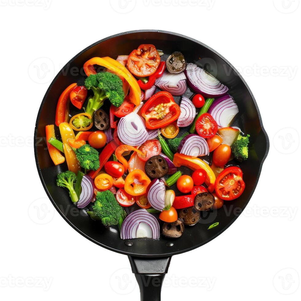 Frying pan full of fresh chopped vegetables ready to cook photo