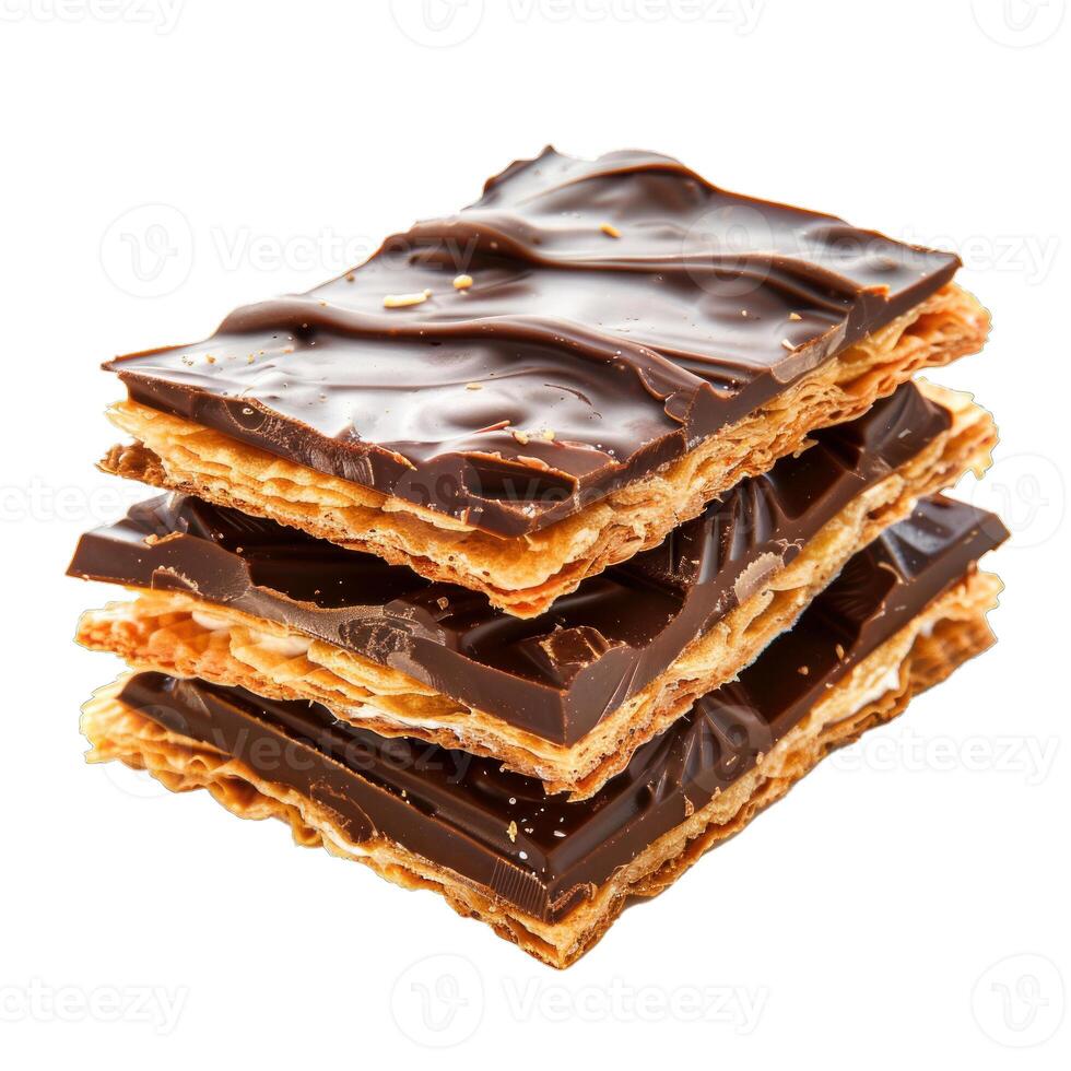 Square puff pastry cookies with melted chocolate on top forming a stack photo