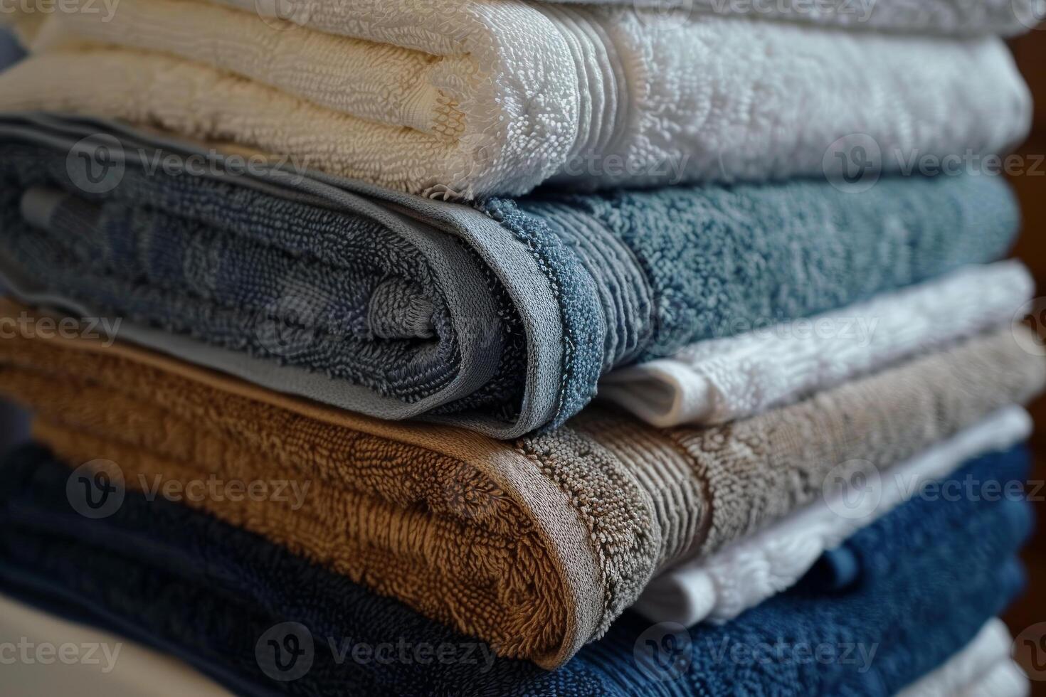 Stack of clean folded towels creating relaxing spa ambiance photo